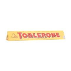 TOBLERONE Sveic.pien.šokoladas toblerone su medumi ir migdolu nuga 100g